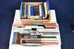Two boxes containing a miscellaneous collection of books