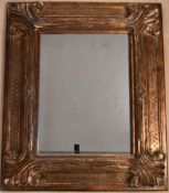 A contemporary Florentine style mirror. H.119 W.99 D.8cm