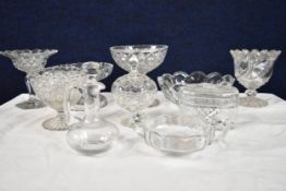 A mixed collection of cut crystal items.