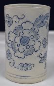 A white salt-glazed tankard, Staffordshire C.1750 with blue floral pattern. H.13cm