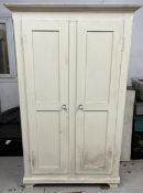 A painted two door hall cupboard. H.184 W.114 D.55cm