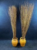 A pair of glazed earthenware pots with willow decoration. Pots H.44 Dia.30cm. Overall height 200cm.