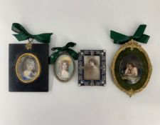 Three 19th century framed portrait miniature paintings along with a C.1900 framed miniature