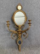 A 19th century giltwood and gesso girandole mirror with three plates set in beaded frames with