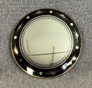 An Art Deco circular convex wall mirror. Dia. 41cm