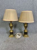 A pair of mid century gilt metal and bronze classical style table lamps. H.60cm (each)
