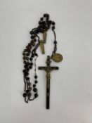 A vintage brass crucifix with rosary beads and medallion. H.20cm (crucifix)