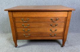 A C.1900 oak plan or architect's chest fitted with four drawers to the front and a frieze drawer