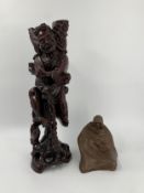 A large Japanese root carving of a man along with a moulded cloaked and seated figure. H.45cm (