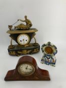 A 19th century mantel clock, bronze with ormolu mounts along with two other mantel clocks. H.34cm (