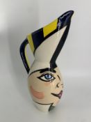 A hand decorated limited edition jug, marked Cirque du Soleil and signed to the underside. H.40cm