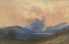 An early 20th century watercolour, Scottish loch, gallery label to the reverse, monogrammed. H.40