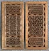 A pair of Indian hardwood pierced screens. H.101 W.46cm (each)