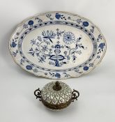 A 19th century Meissen blue and white charger along with a hand decorated Sevres lidded pot. W.