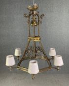 A vintage brass Neo - Gothic six branch chandelier. H.88cm