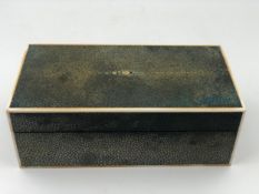 An Art Deco shagreen cigar box with cedar lined interior. W.20 D.10 H.7cm.
