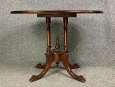 A 19th century style mahogany and satinwood inlaid centre table. H.73 W.98 D.66cm
