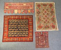 A collection of hand embroidered Indian textiles and wall hangings. H.126 W.126cm (largest)