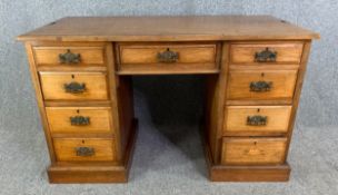 A 19th century walnut pedestal desk. H.76 W.122 D.54cm