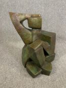 A patinated bronze figure in the Cubist manner, first half of 20th century. H.49cm