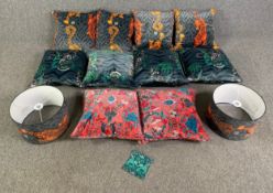 A collection of ten Emma Shipley cushions and a pair of similar pendant lampshades. H.24 Dia.36cm (