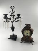 A vintage bronze table candelabra with crystal drops and a 19th century French style walnut cased