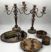 A pair of silver plated three branch table candelabras along with miscellaneous silver plated items.
