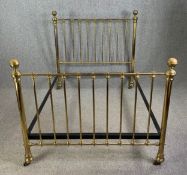A Victorian brass bedstead (To take a 4 ft 6 inch double mattress). H.137 L.288 W.141cm