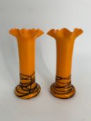 A pair of mid century tango glass vases. H.15cm (each)