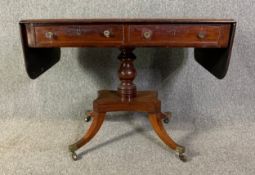 Sofa table, Regency mahogany drop flap on quadruped swept supports. H.72 W.94 (154 extended) D.59cm