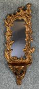 A 19th century style moulded gilt frame pier glass. H.82 W.30cm