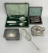 A miscellaneous collection of silver plated items, including a tea caddy, 19th century nut