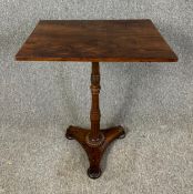 An early 19th century rosewood occasional or lamp table on platform base. H.72 W.59 D.45cm