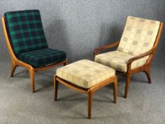 A mid century Danish teak armchair with matching footstool in original upholstery along with the