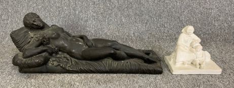 A moulded figure of a classical style nude along with a plaster figure group of a mother and