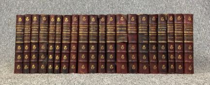 A set of twenty late 19th century Dickens novels, Chapman & Hall 1893, half leather bound. H.20cm (