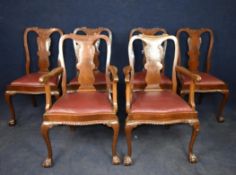 Dining chairs, a set of six mid Georgian style walnut to include two carver elbow chairs.