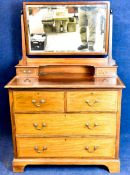 An Edwardian mahogany and satinwood strung dressing table with maker's label. H.150 W.99 D.53cm