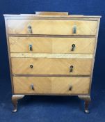 A mid century walnut chest of drawers. H.111 W.85 D.51.cm