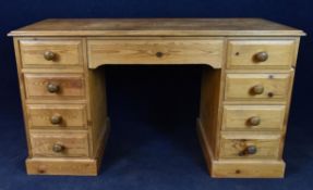 A Victorian style pine desk. H.79 W.137 D.58cm