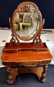 A Victorian mahogany Duchess style dressing table. H.166 W.105 D.50cm