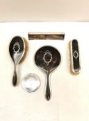 A Victorian four piece silver and tortoiseshell dressing table set along with a white metal (tests