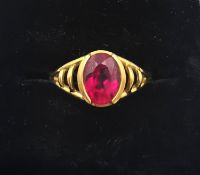 A vintage 18ct yellow gold and rubellite dress ring by Amsterdam Sauer, set with an oval mixed cut