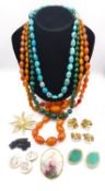 A collection of mixed costume jewellery, including two pairs of Miriam Haskell brass and faux