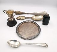 A collection of silver, including a double ended Edwardian medicine spoon by Holland, Aldwinckle &
