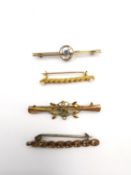A collection of four antique gold bar brooches, including a French 18ct yellow gold and seed pearl