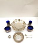 A collection of silver, including a pair of Victorian silver salts, an openwork repousse silver bowl