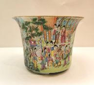 A 19th century Famille Rose hand painted porcelain flared rim planter with mountain village and