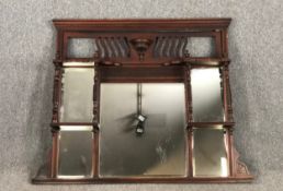A late 19th century mahogany overmantel mirror. H.106 W.137cm.