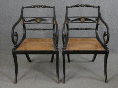 A pair of Regency armchairs, ebonised and with ormolu mounts. H.86cm (each).